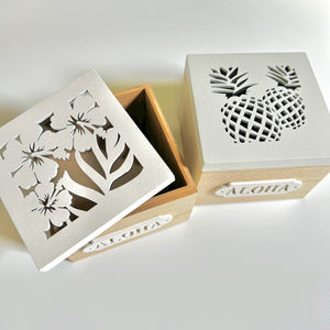 Square wooden boxes with pineapple or hibiscus patterns